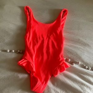 KITTENISH ONE PIECE BRIGHT ORANGE size medium. Never worn